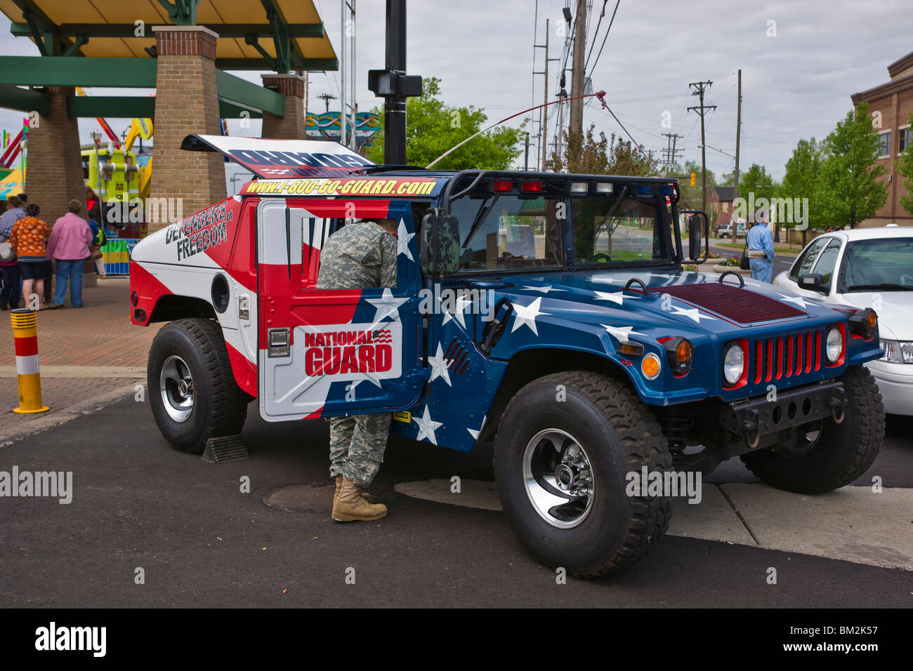 Tulip time festival Dutch Holland Michigan in USA National Guard hummer custom painted with US Flag stars and stripes  hi-res Stock Photo
