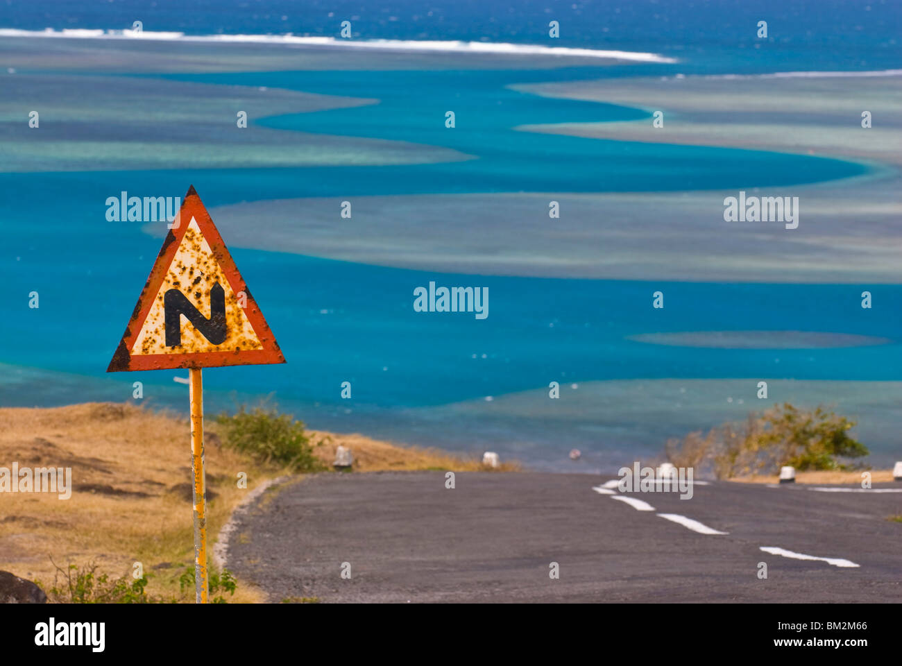 Road leading into zigzag water channel, Rodrigues, Mauritius, Indian Ocean Stock Photo