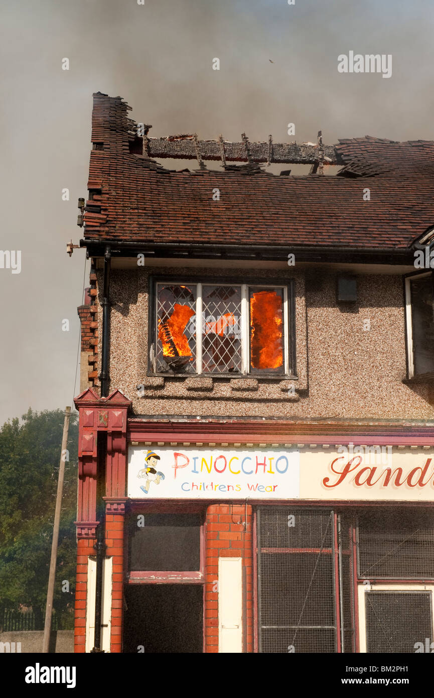 Flat above shop on fire Stock Photo Alamy