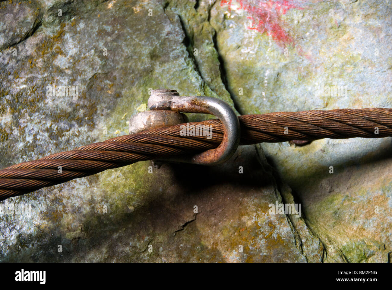 Rusty wire rope and shackle in Cathedral Quarry, near Coniston in the ...