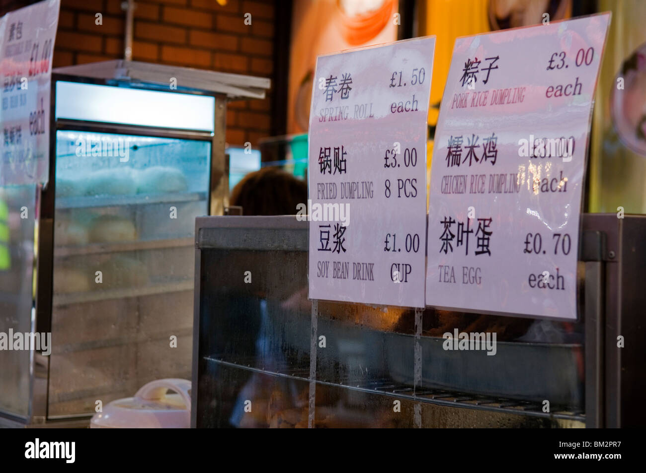 Stall selling Chinese snacks, China Town Chinese New Year Festival London England UK 2010 Stock Photo