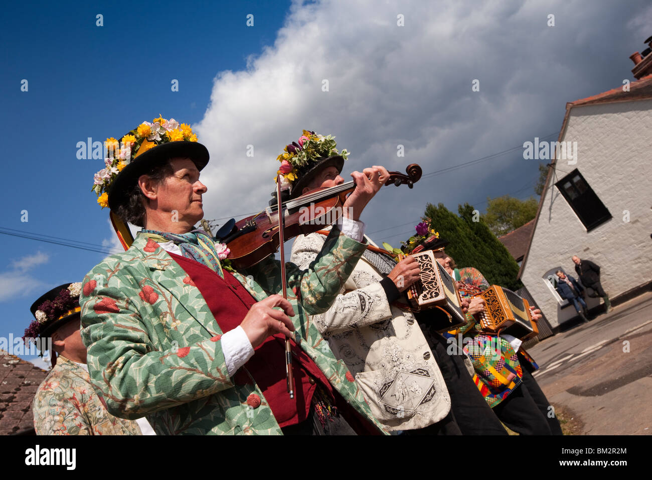 UK, England, Herefordshire, Putley, Big Apple Event, musicians accompanying morris men dancing on village green Stock Photo