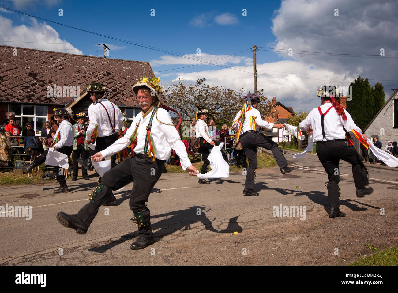 UK, England, Herefordshire, Putley, Big Apple Event, Morris men dancing on village green in sunshine Stock Photo