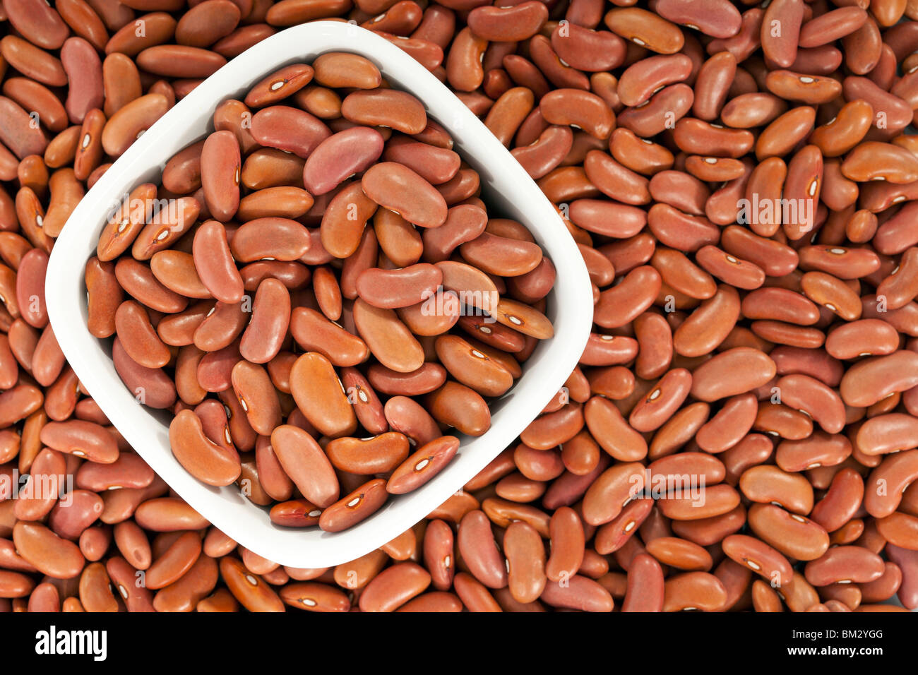Kidney beans or red beans background with a bowl Stock Photo