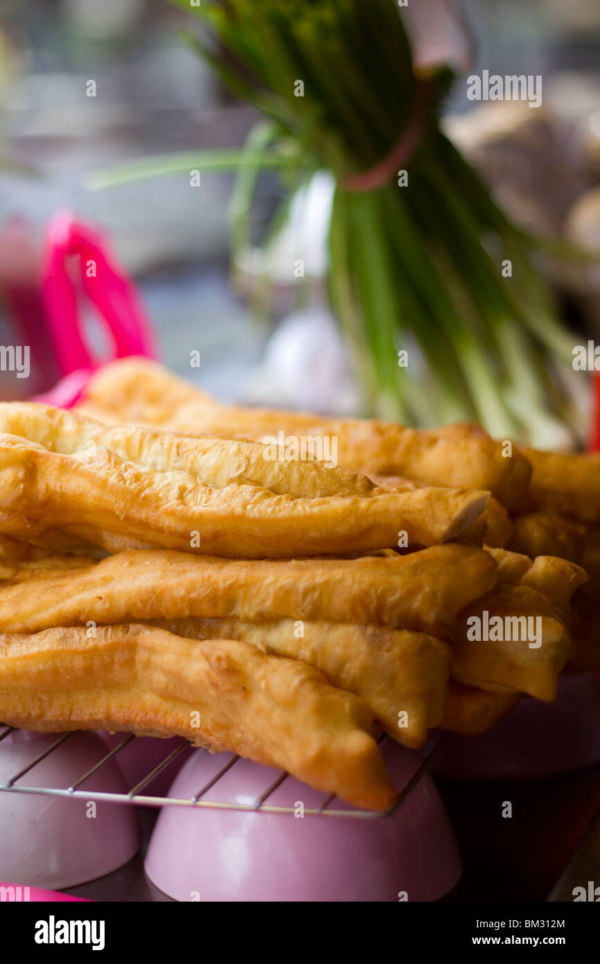Chinese dough sticks in the Ming Tien food court in Taman megah, Damansara, Kuala Lumpur Stock Photo