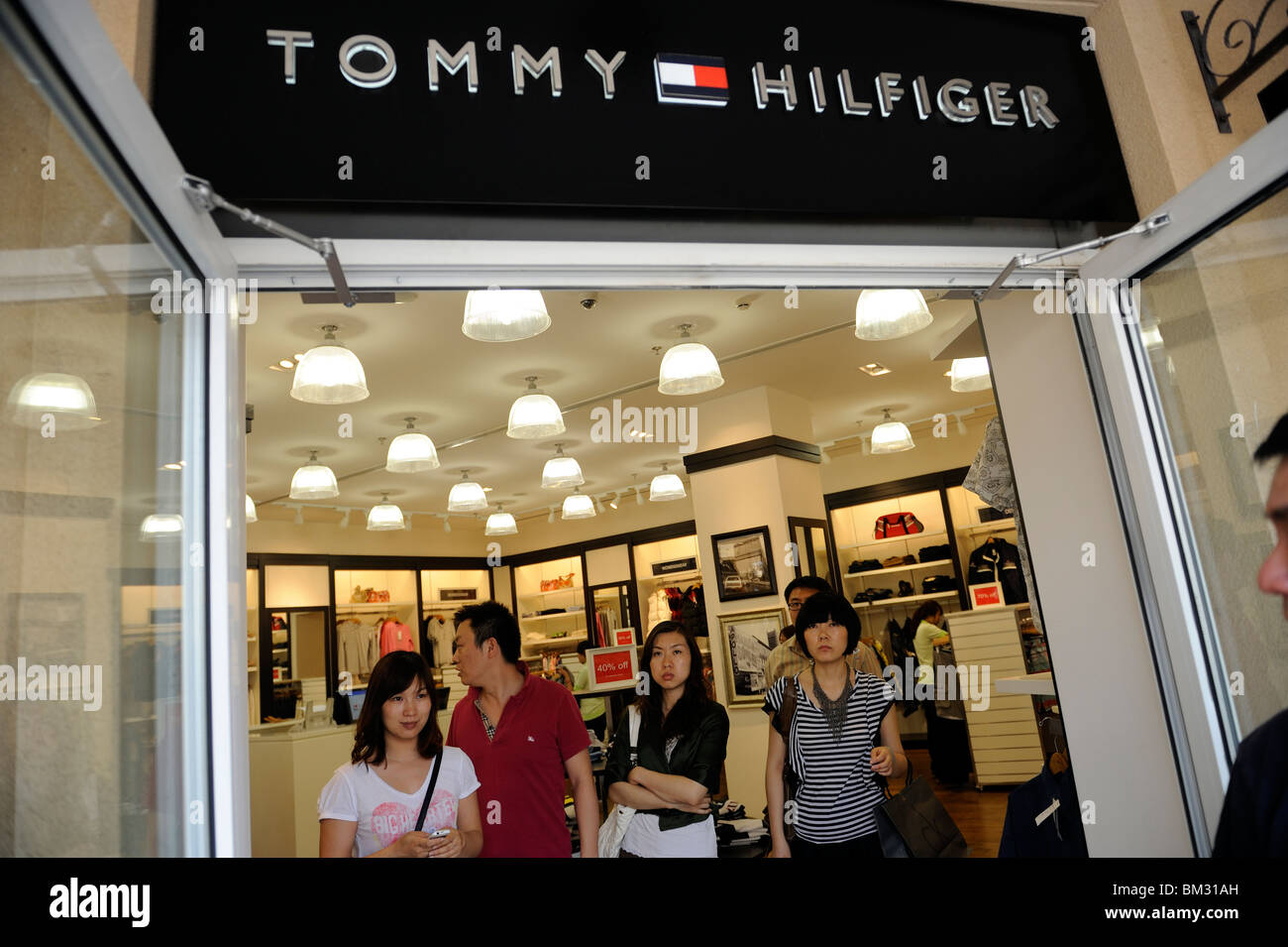 Chinese shopping at a Tommy Hilfiger store at Beijing Scitech Premium Outlet  Mall in Beijing, China. 15-May-2010 Stock Photo - Alamy