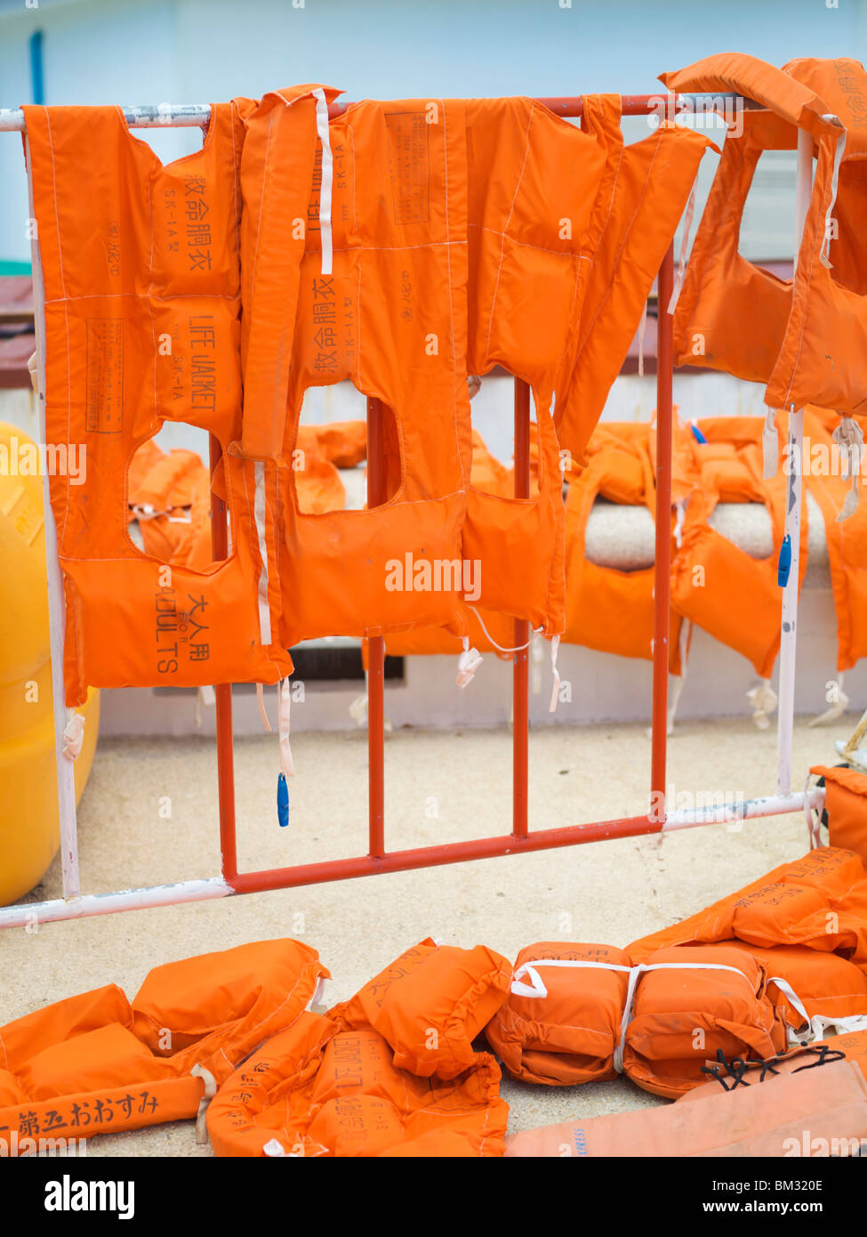 Life jackets drying in the sun Stock Photo Alamy
