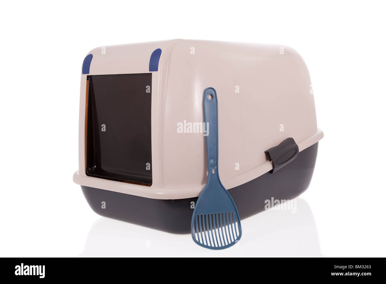 Closed cat litter box with scoop isolated on white background Stock
