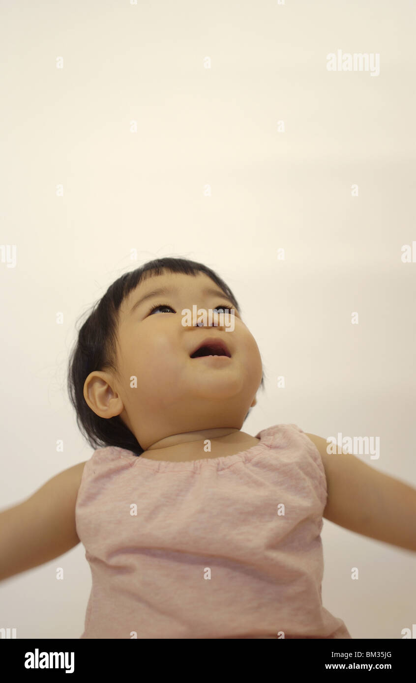 Preschooler Girl Looking Up Stock Photo - Alamy