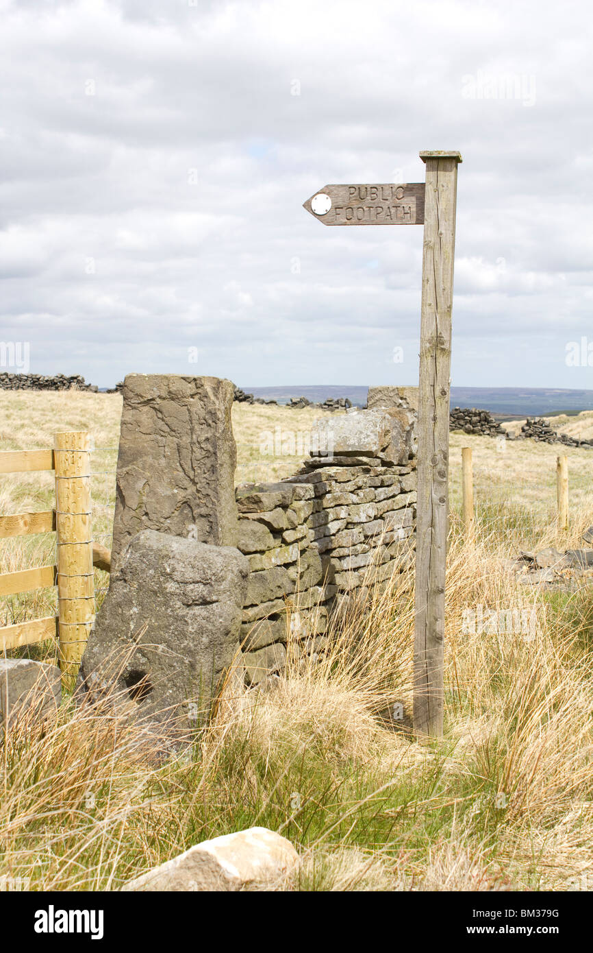Wooden public footpath sign near Halifax, West Yorkshire, England Stock