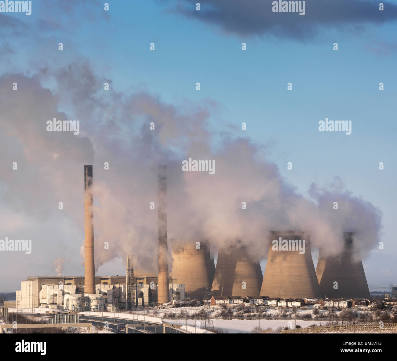 Coal Fired Power Station With Snow Stock Photo