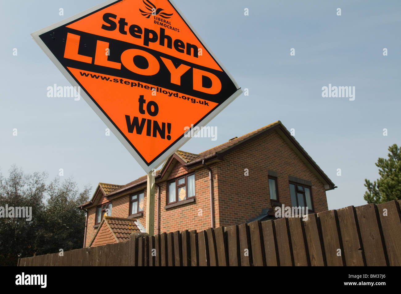 UNITED KINGDOM, ENGLAND, 18th April 2010 - In the run to the 2010 General Election a large candidate's board is put up. Stock Photo