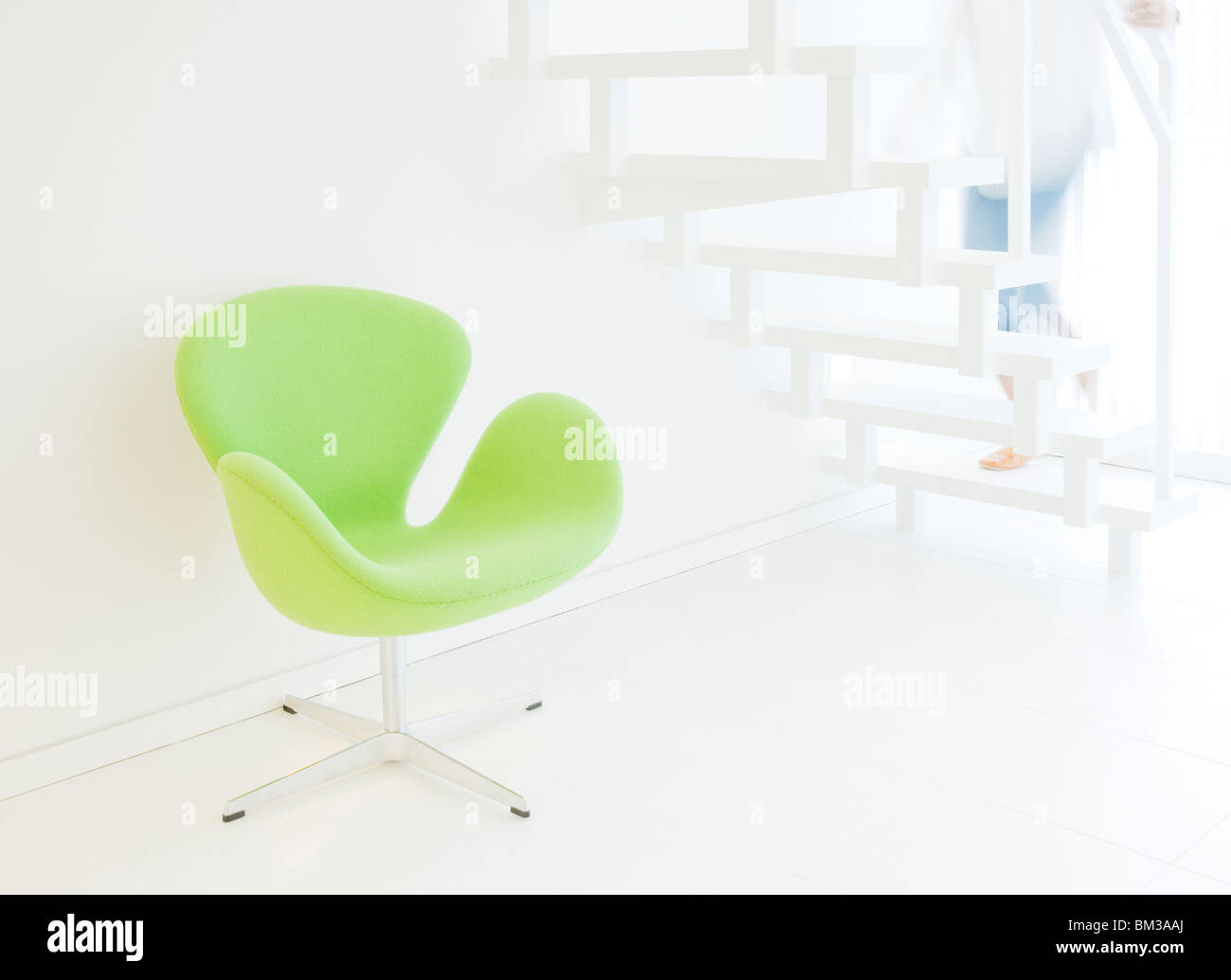 Chair under staircase Stock Photo Alamy