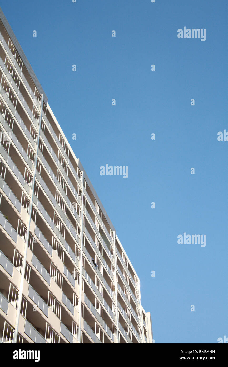 Exterior of apartment building against sky, blue background Stock Photo ...