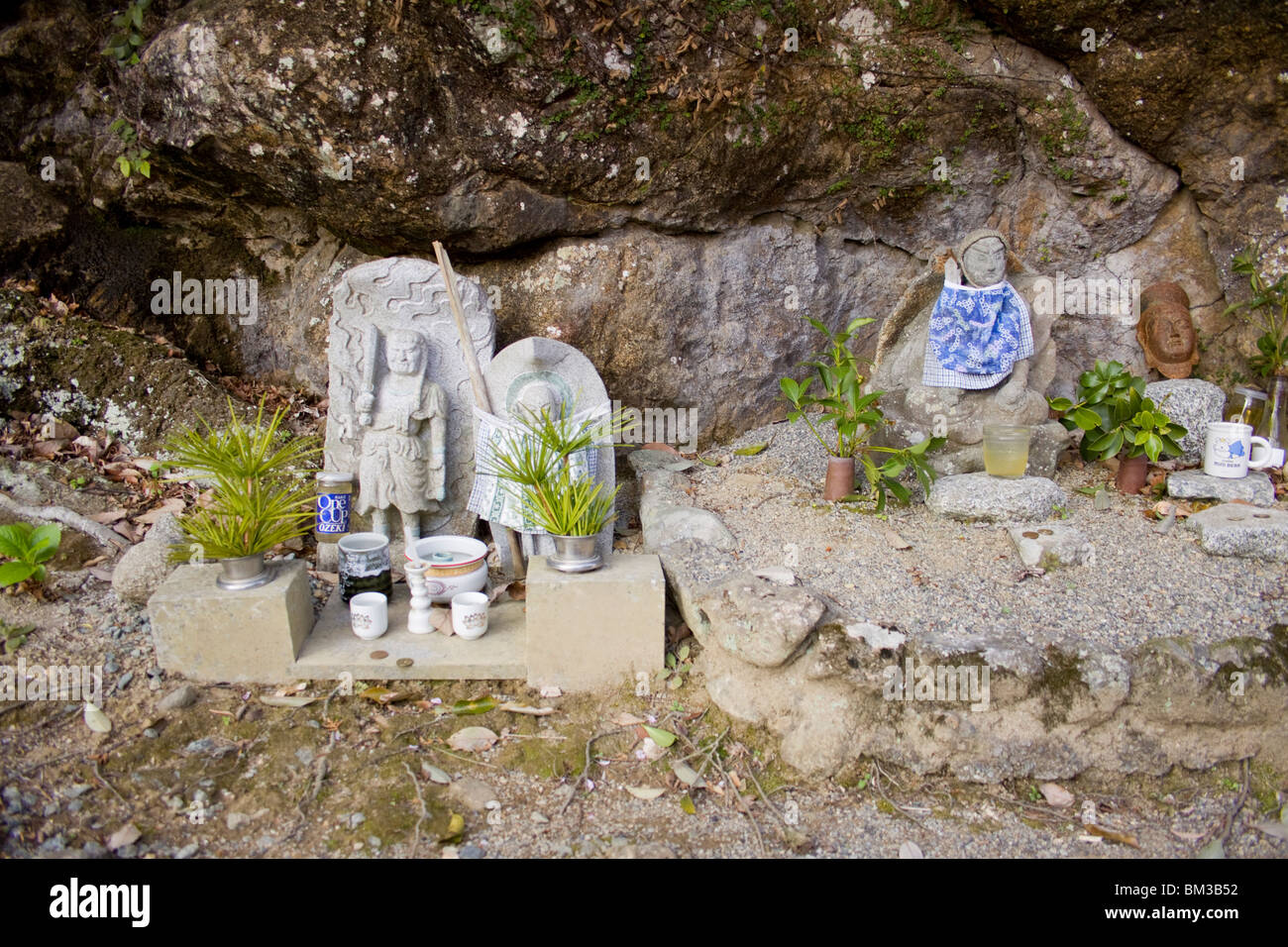 Statues in rural Japanese Shrine in Taki-cho, Japan Stock Photo