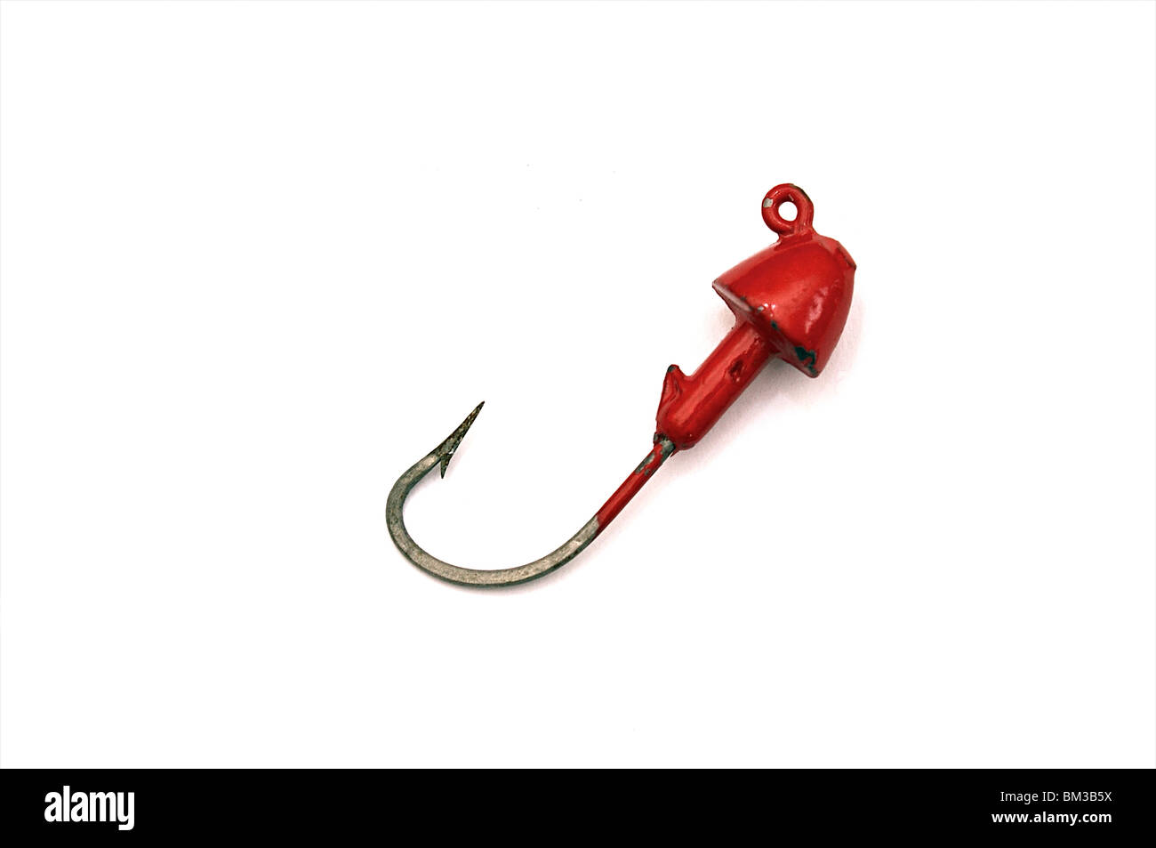 red antique weighted fish hook on white background with shadow Stock