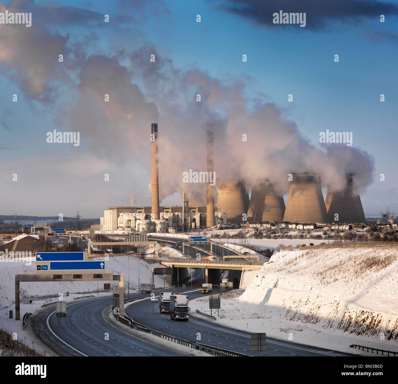 Coal Fired Power Station With Snow Stock Photo