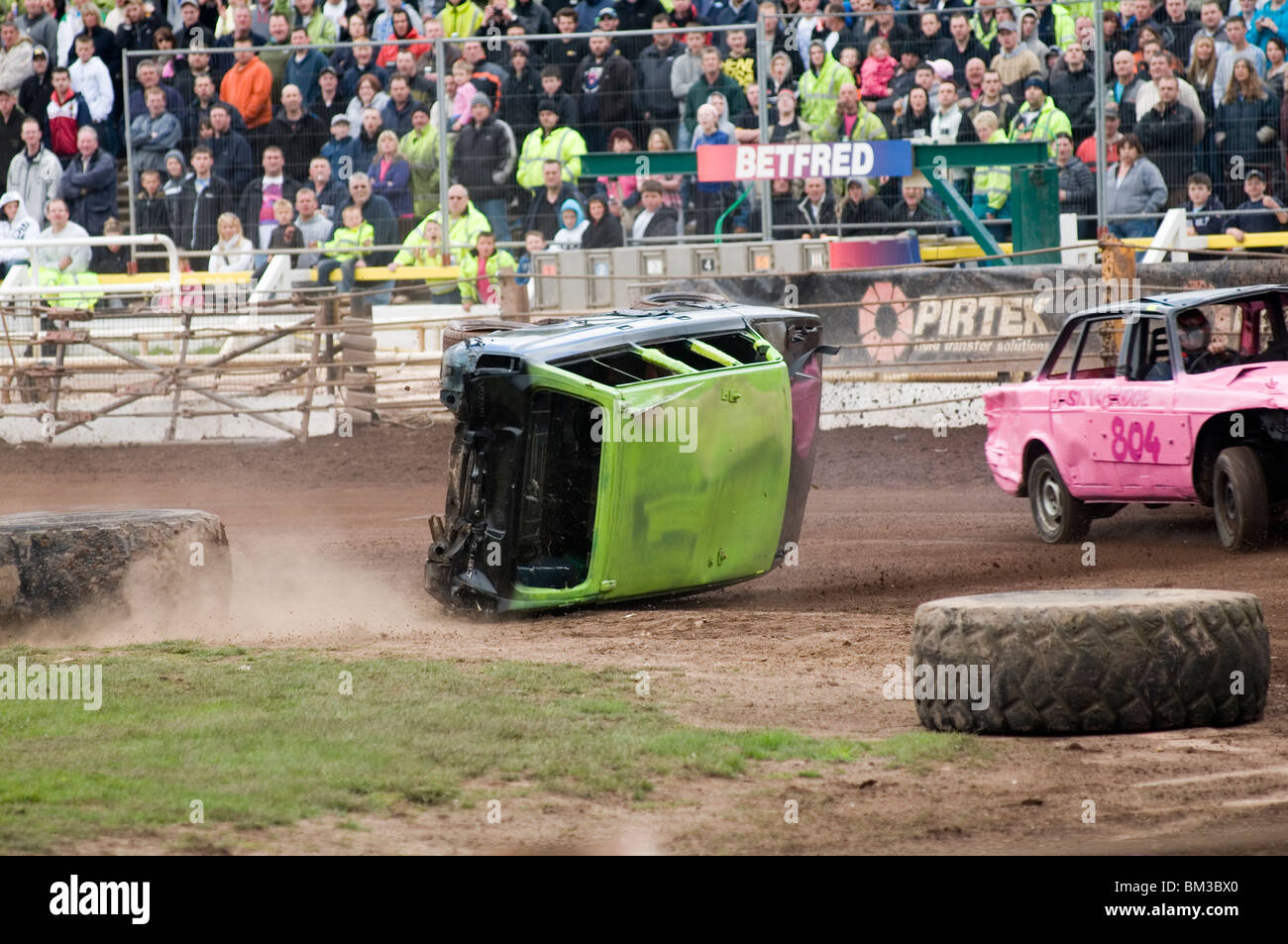 volvo estate car rolling over in a banger race Stock Photo Alamy