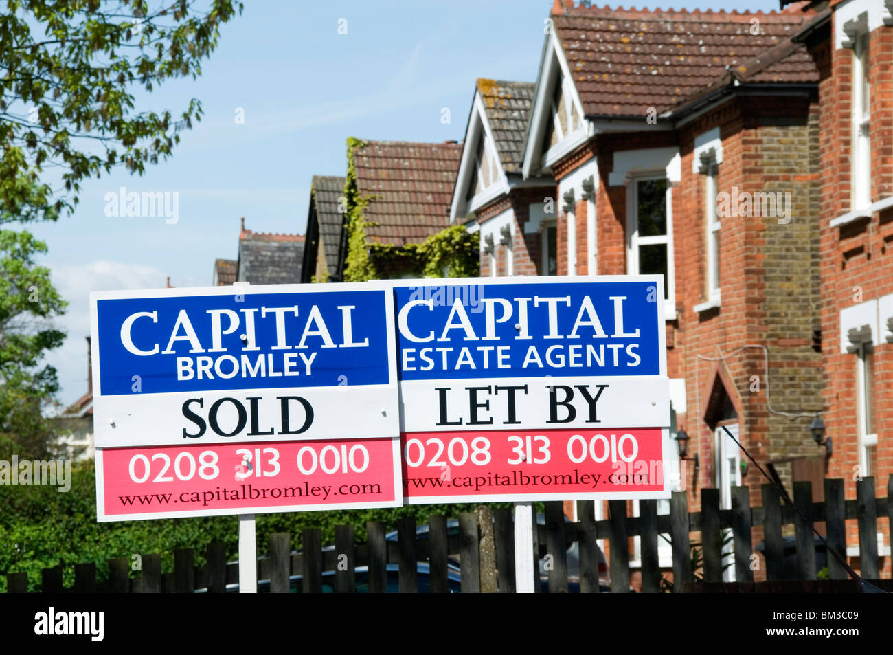 Estate Agents' boards in Bromley, South London Stock Photo Alamy