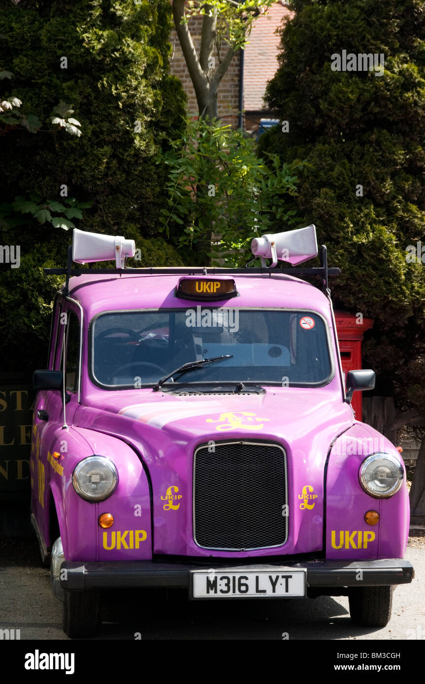 The UKIP pink taxi used for electioneering or canvassing. Stock Photo