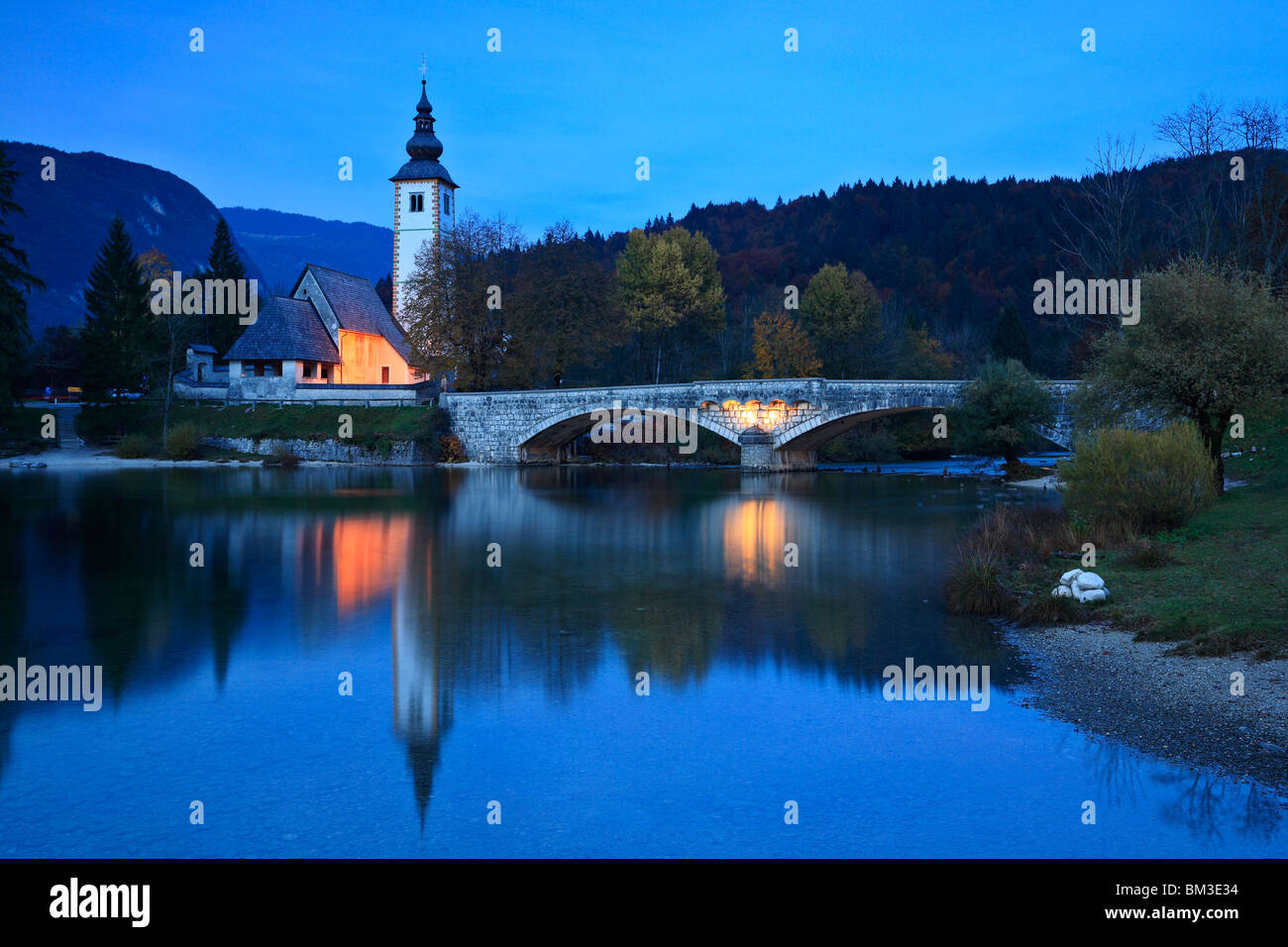 Evening settles in over the Church of St. John in Ribcev Laz on Lake Bohinj, Gorenjska, Slovenia Stock Photo