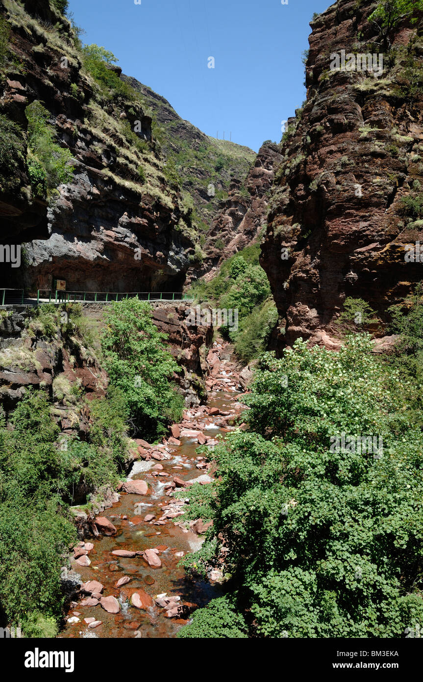 Red Shale Rocks & River Flowing through the Cians Gorge, Alpes-Maritimes, France Stock Photo