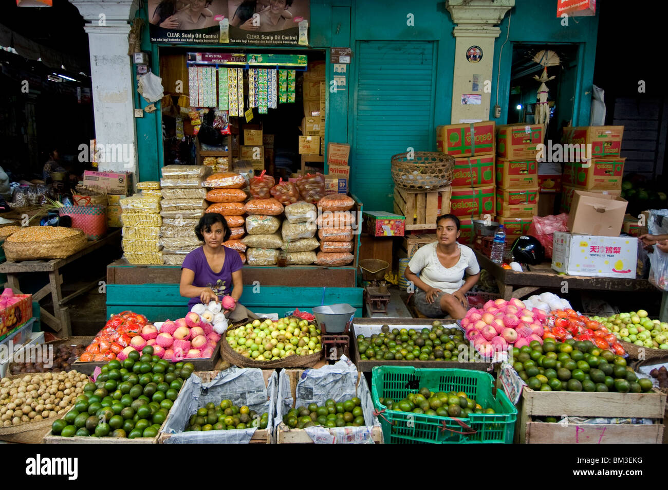 Local traders selling local fruit and vegetable produce at market in