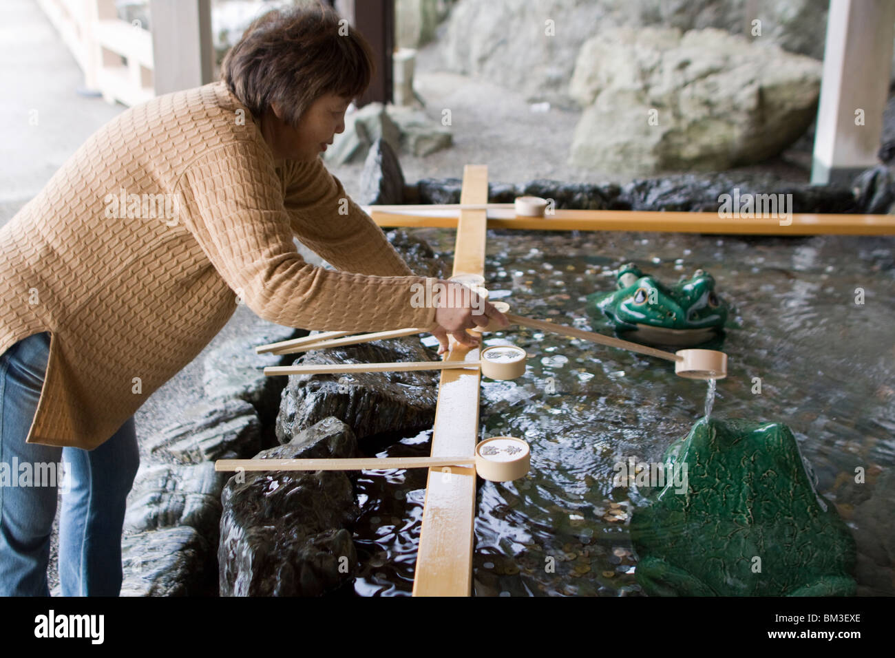 A place to cleanse your hands at the Okitama Shrine by Meoto Iwa the wedded rocks of Futami, Mie, Japan. Stock Photo