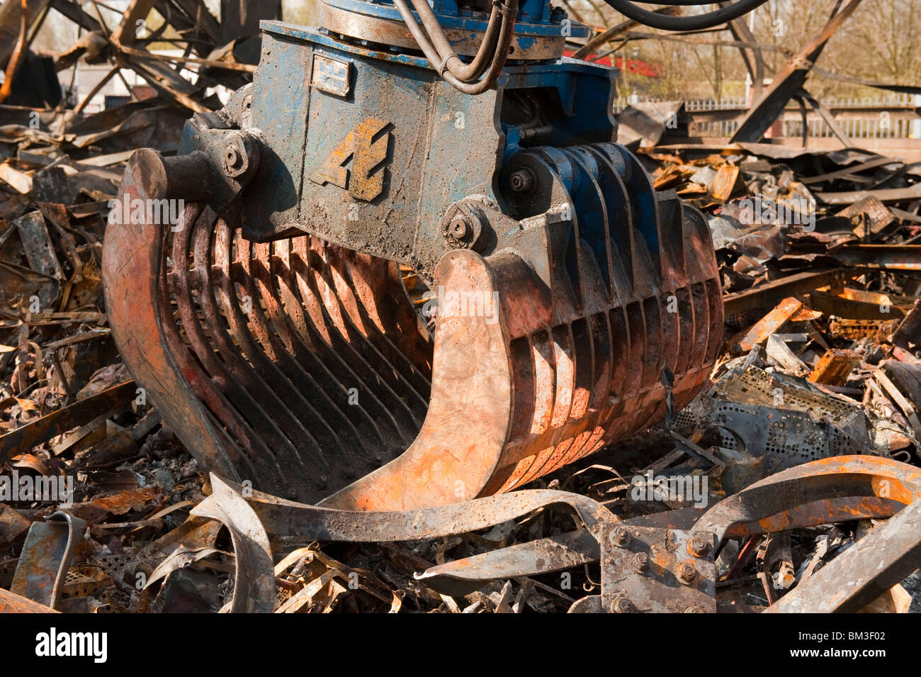 Digger grab hook bucket lifting steel Stock Photo Alamy