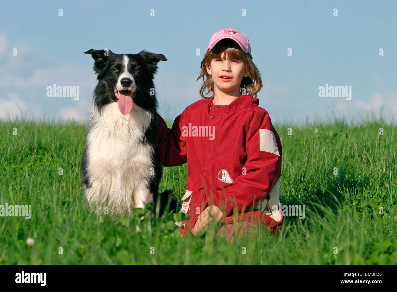 Mädchen mit Border Collie / girl with Border Collie Stock Photo