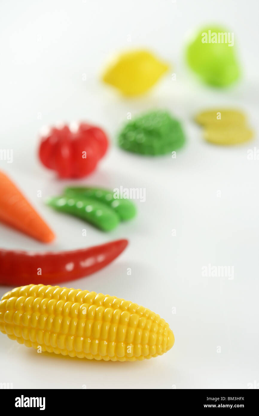 Plastic game, fake varied vegetables and fruits. Children food