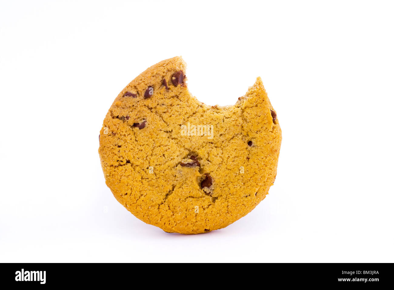 chocolate chip cookie with a bite taken on white Stock Photo