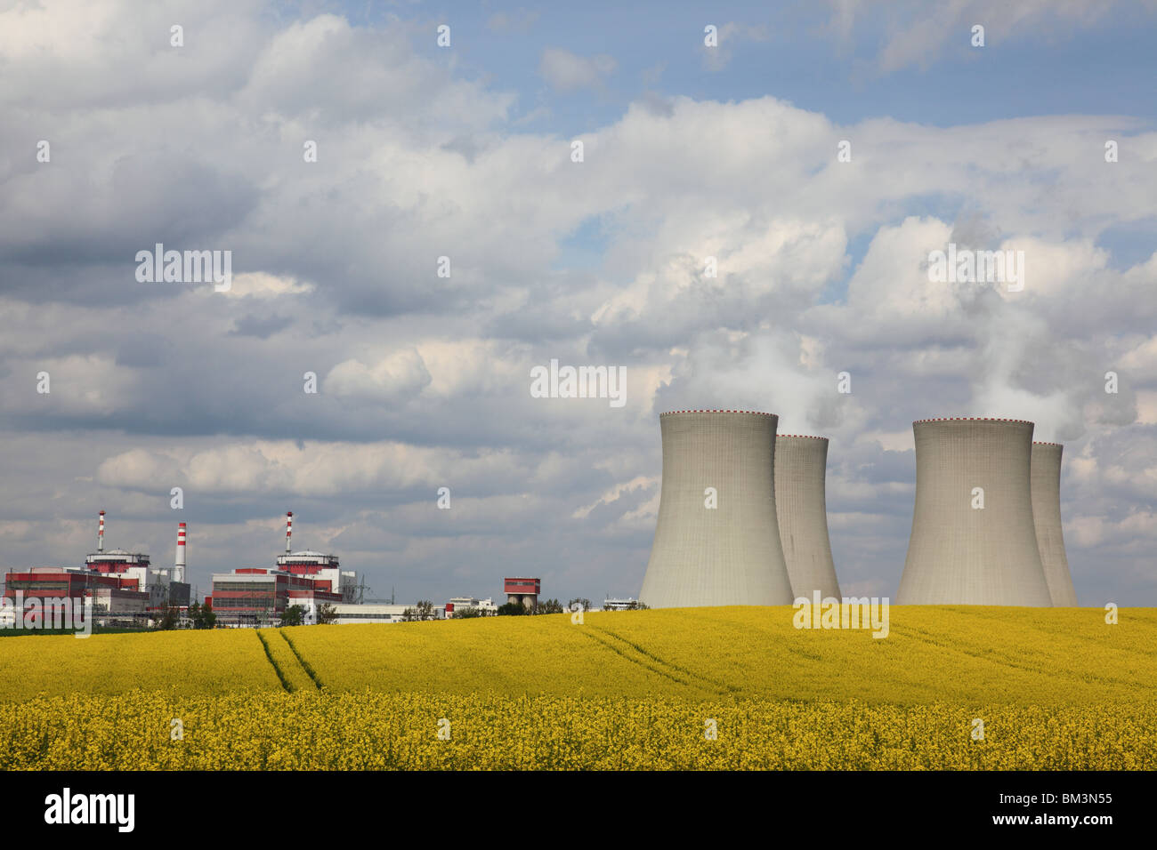 4 cooling towers of Temelin nuclear power plant and rape field, Czech ...