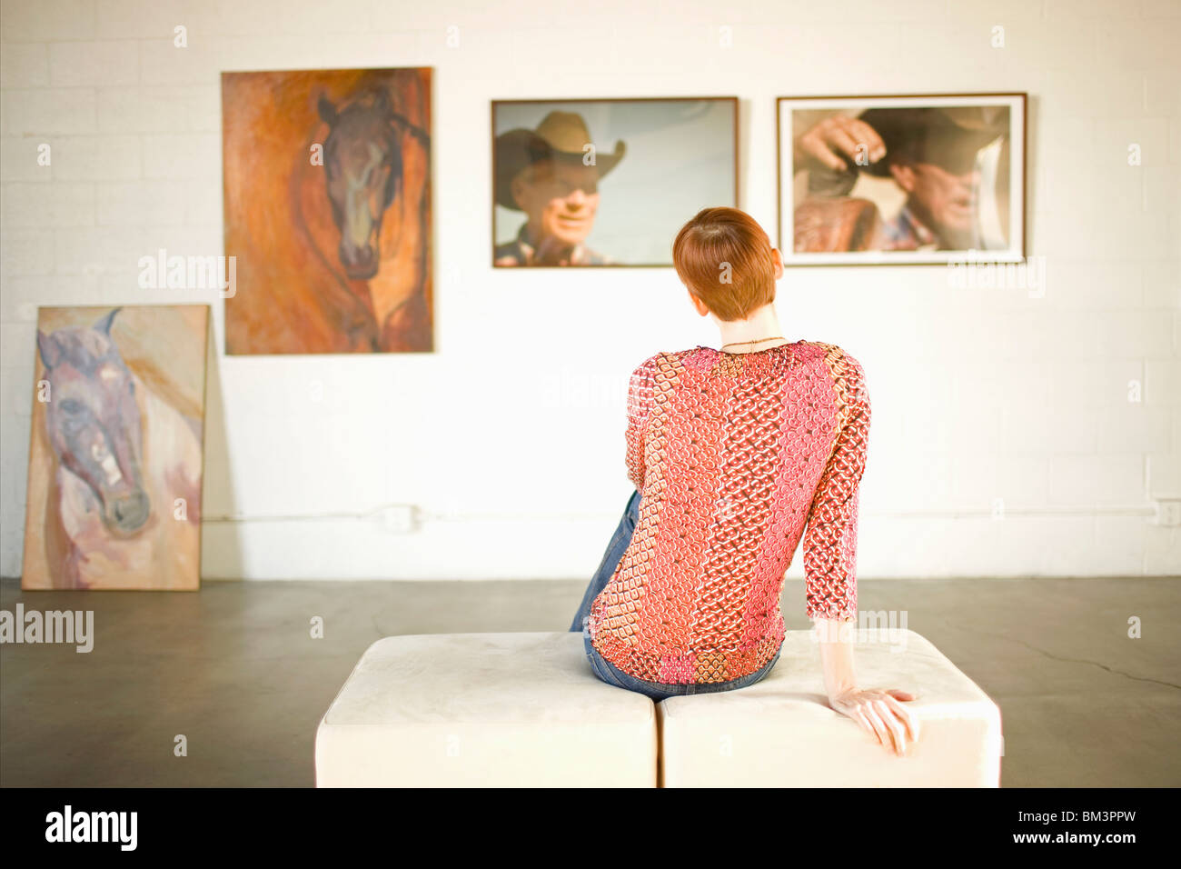 Woman in art gallery Stock Photo