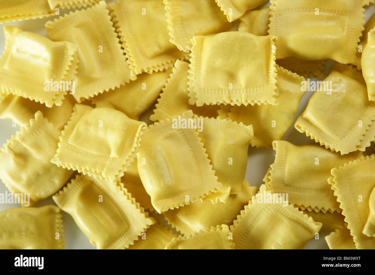 Download Cheese Filled Italian Yellow Pasta Texture White Background Stock Photo Alamy Yellowimages Mockups