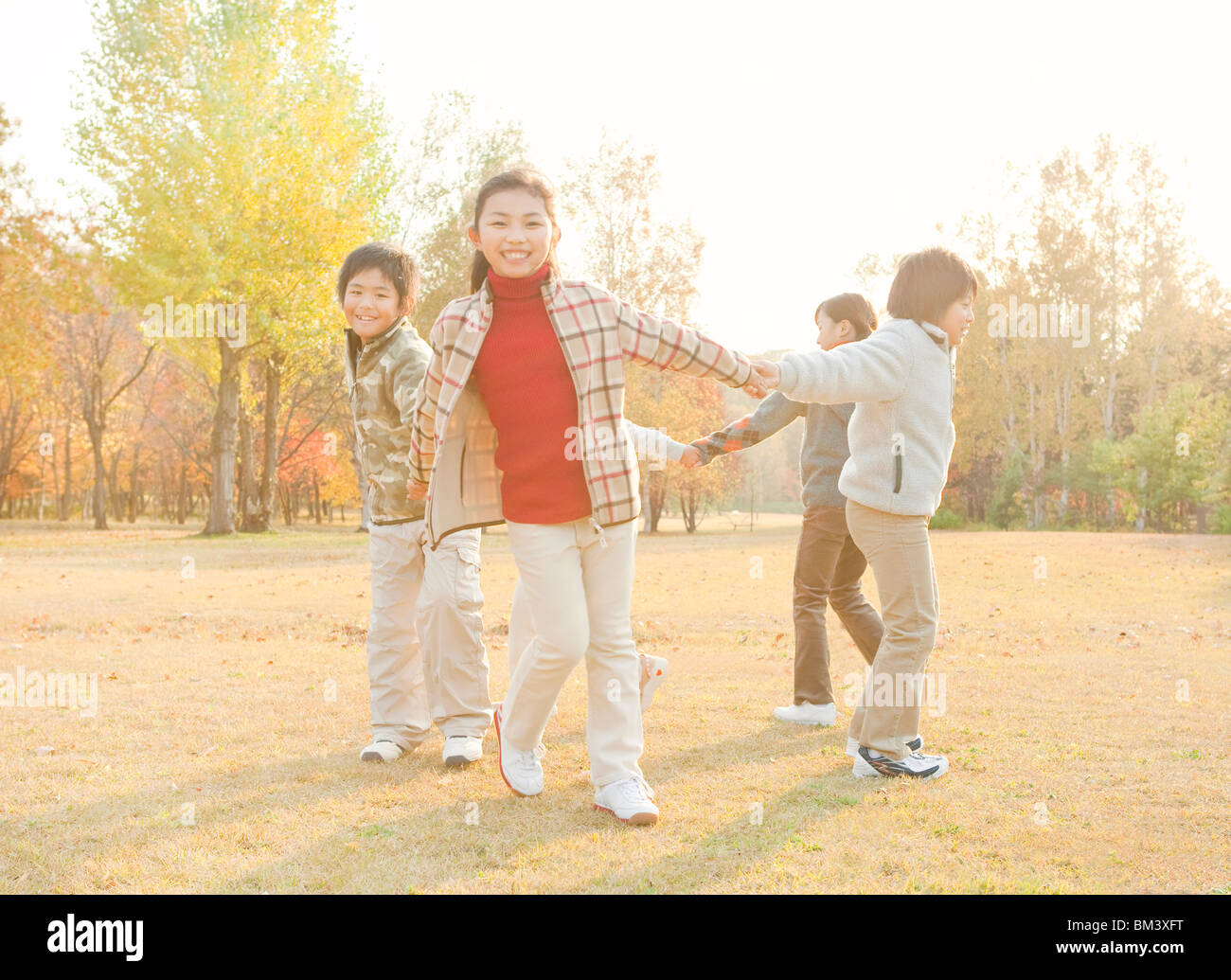Friends playing together Stock Photo - Alamy
