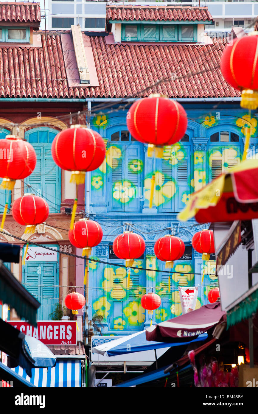 Lanterns hang above the night market during Chinese New Year celebrations, Trengganu Street, Chinatown, Singapore Stock Photo