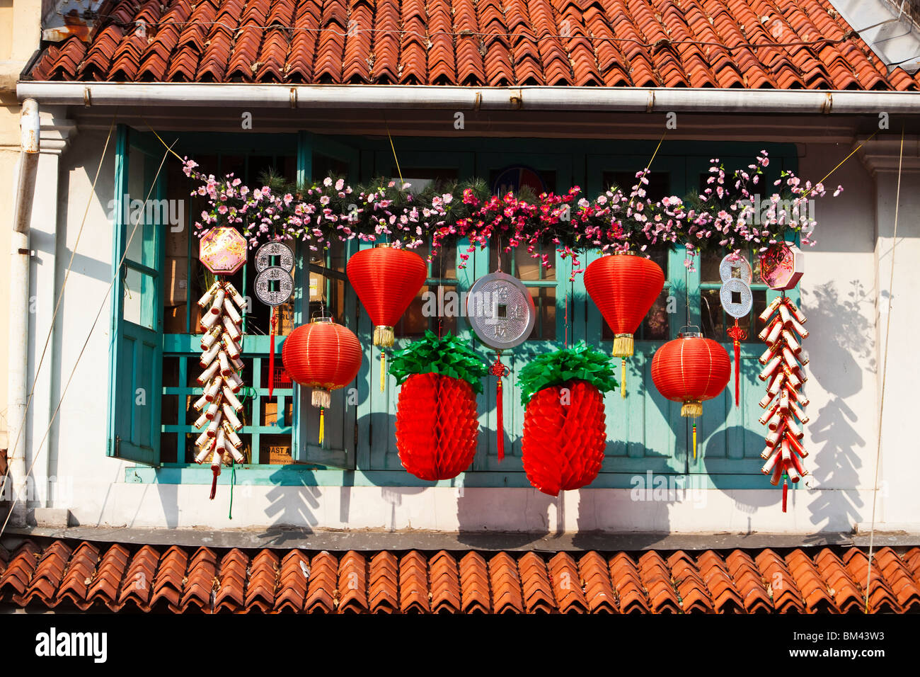 Chinese New Year decorations on a shophouse in Kampong Glam, Singapore Stock Photo