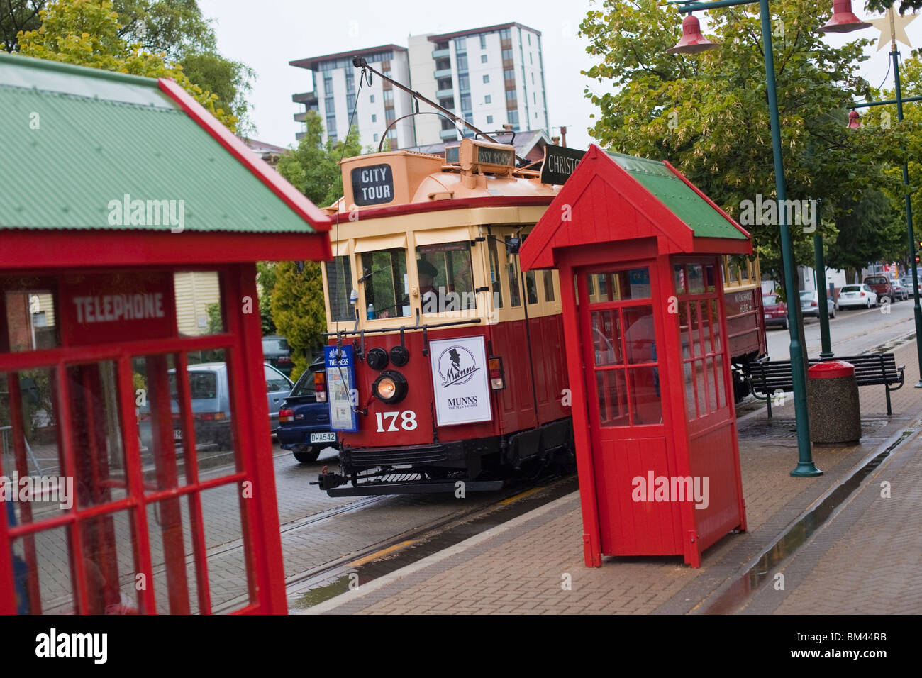 City tram and old fashioned telephone boxes. Christchurch, Canterbury, South Island, New Zealand Stock Photo