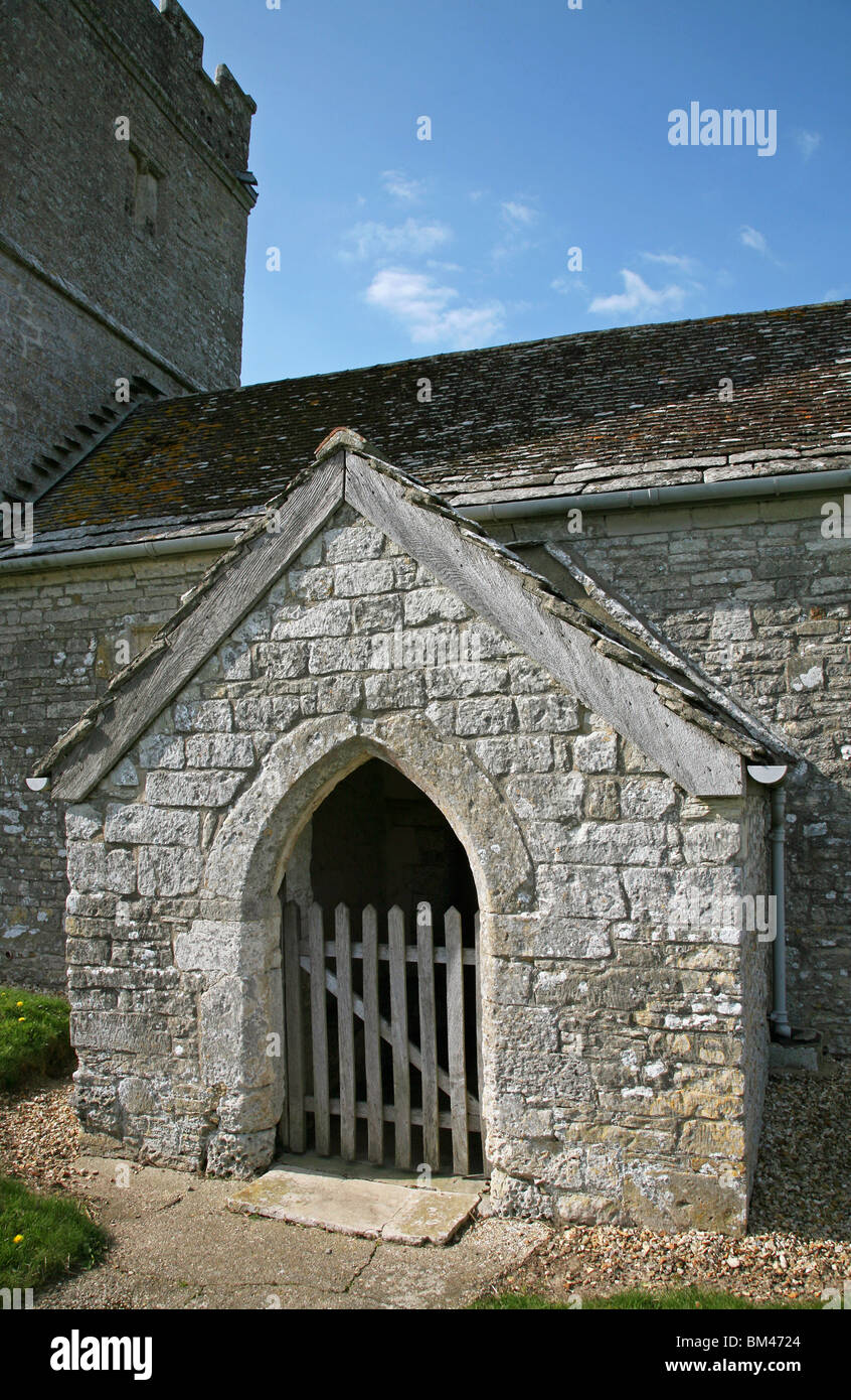 Entrance to the ancient church in the attractive thatched village of Whitcombe near Dorchester Stock Photo