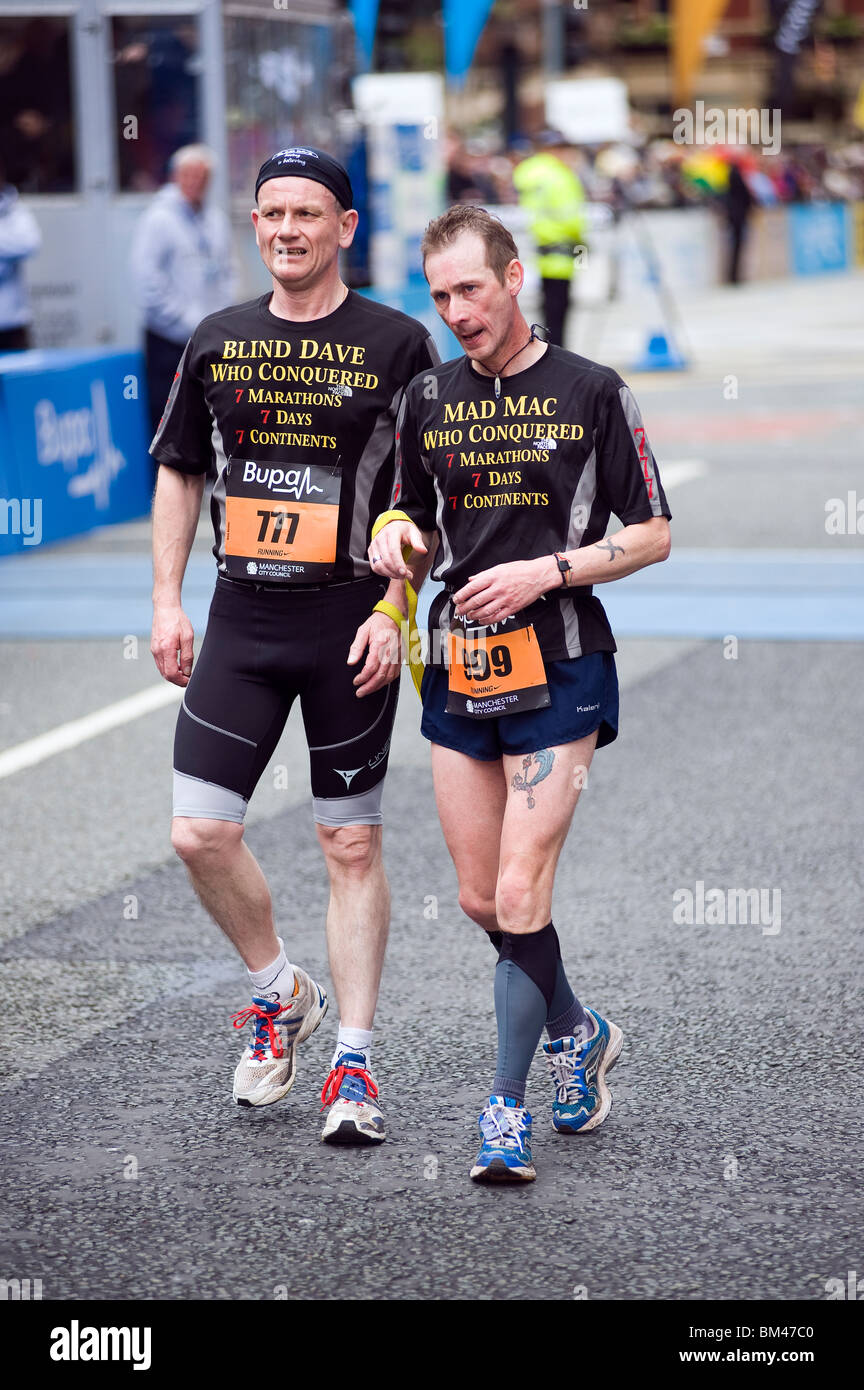 Blind runner and guide, Manchester great run, May 2010 Stock Photo