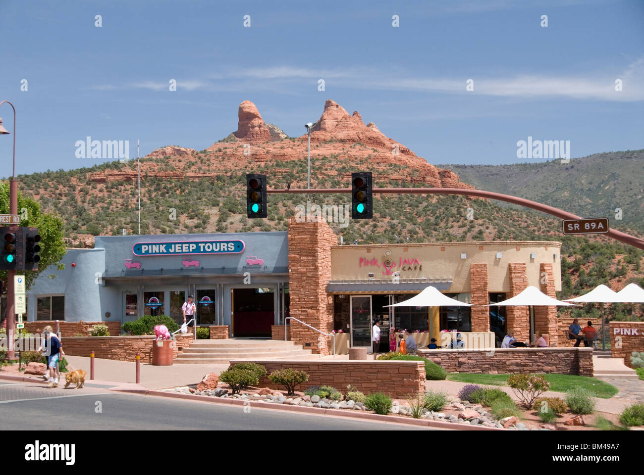 Shops shopping and Pink Jeep Tours in main street Highway 89A through the city of Sedona Arizona USA Stock Photo