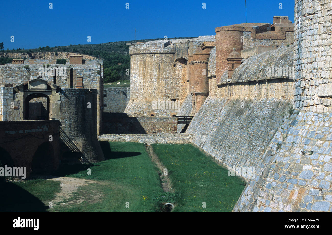 Dry Moat, Entrance & Defensive Walls or Fortifications of Salses Fortress or Fort (c15th) near Perpignan, South West France Stock Photo