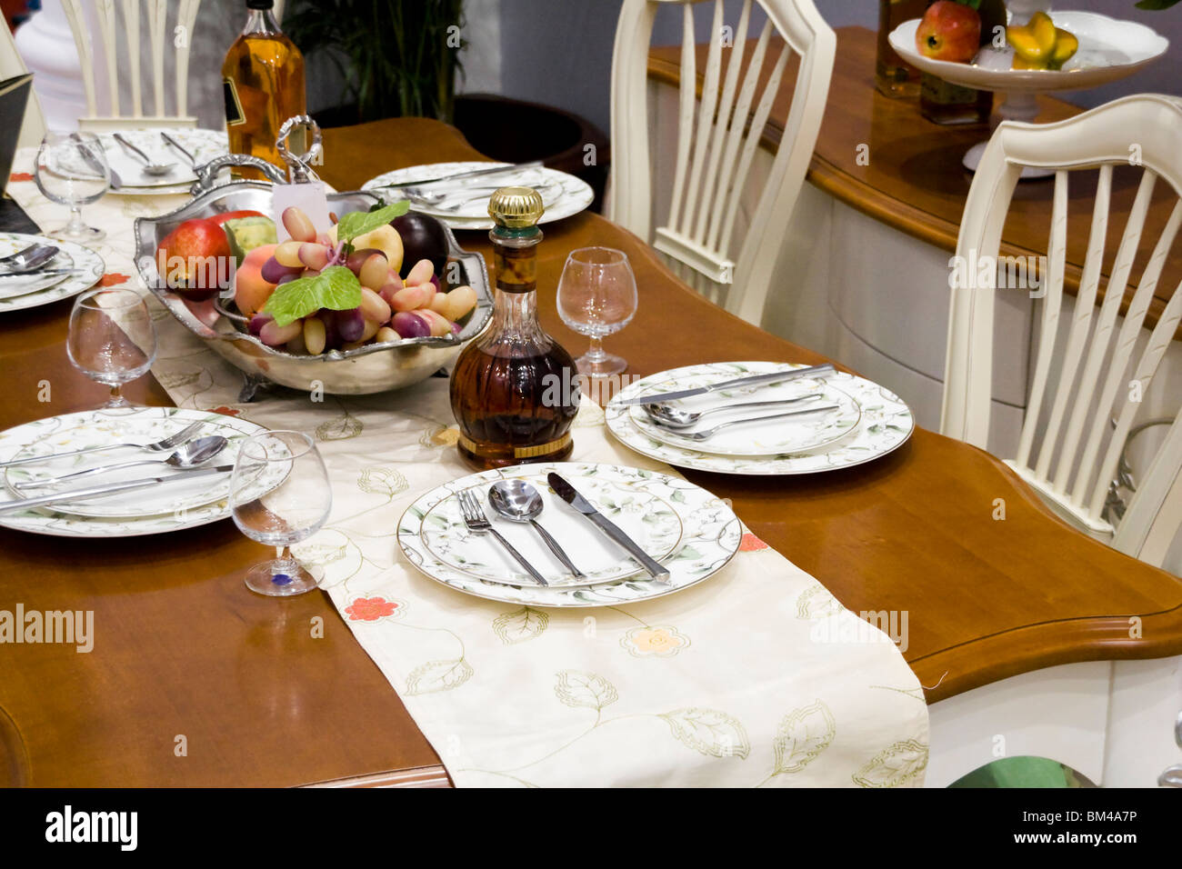 Dining table in a dining room Stock Photo