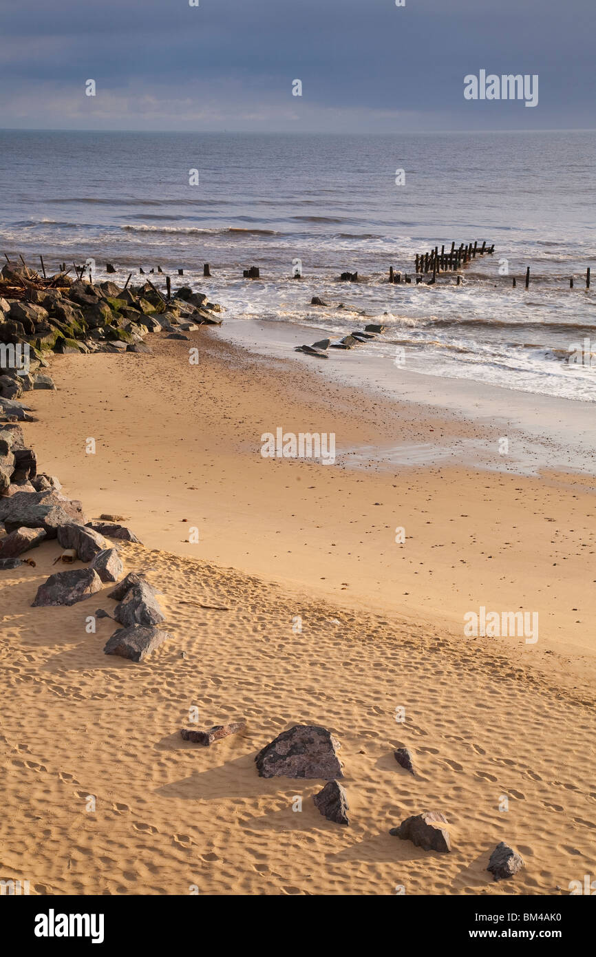 Evidence of coastal erosion near Happisburgh Norfolk Stock Photo - Alamy