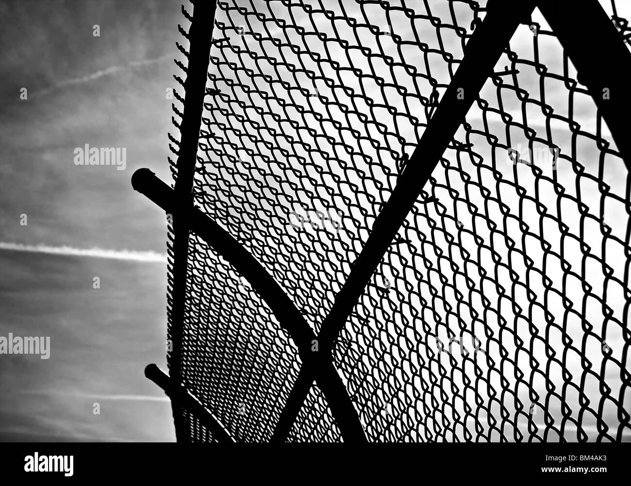 Chain link fence sky Black and White Stock Photos & Images - Alamy