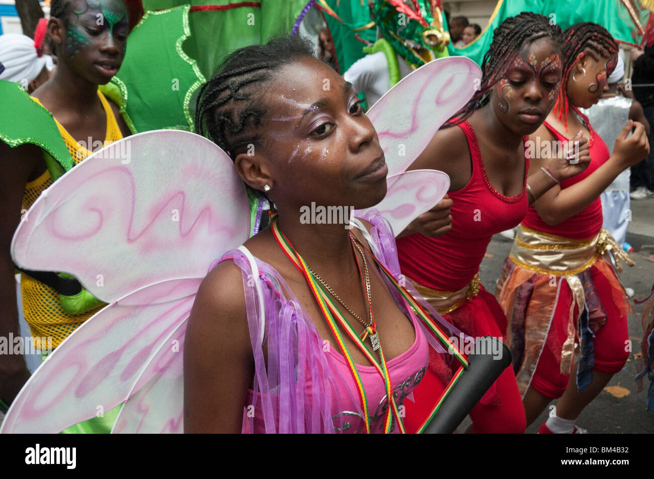 Young black Afro Caribbean girls in carnival costume - one with wings ...