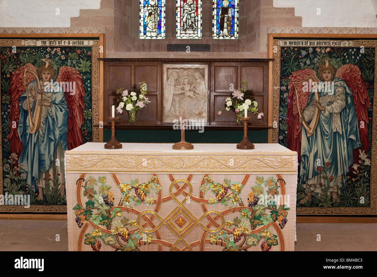 UK, Englan, Herefordshire, Brockhampton, All Saints Arts and Crafts Church, altar with Edward Burne Jones textiles Stock Photo