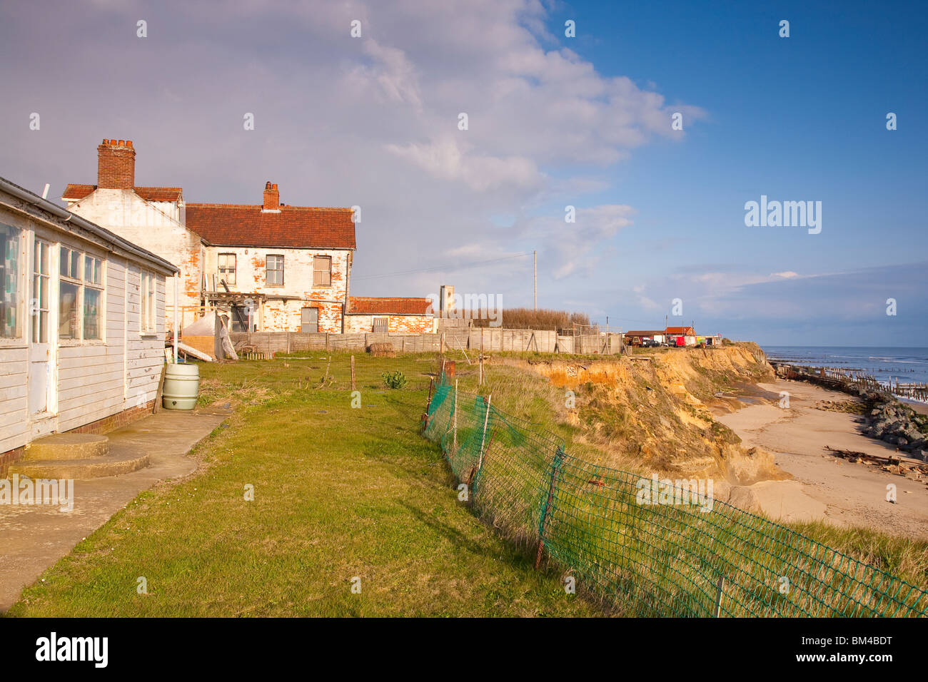 Homes perilously close to cliff edge due to coastal erosion Norfolk
