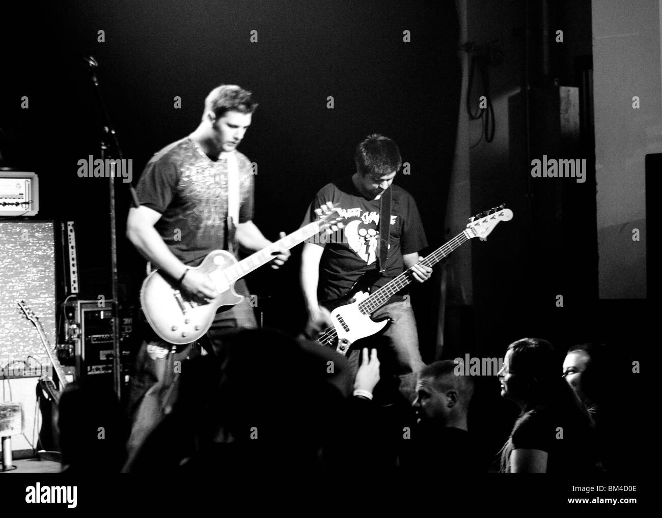 Rock and Roll band guitarist and bass player on stage Stock Photo